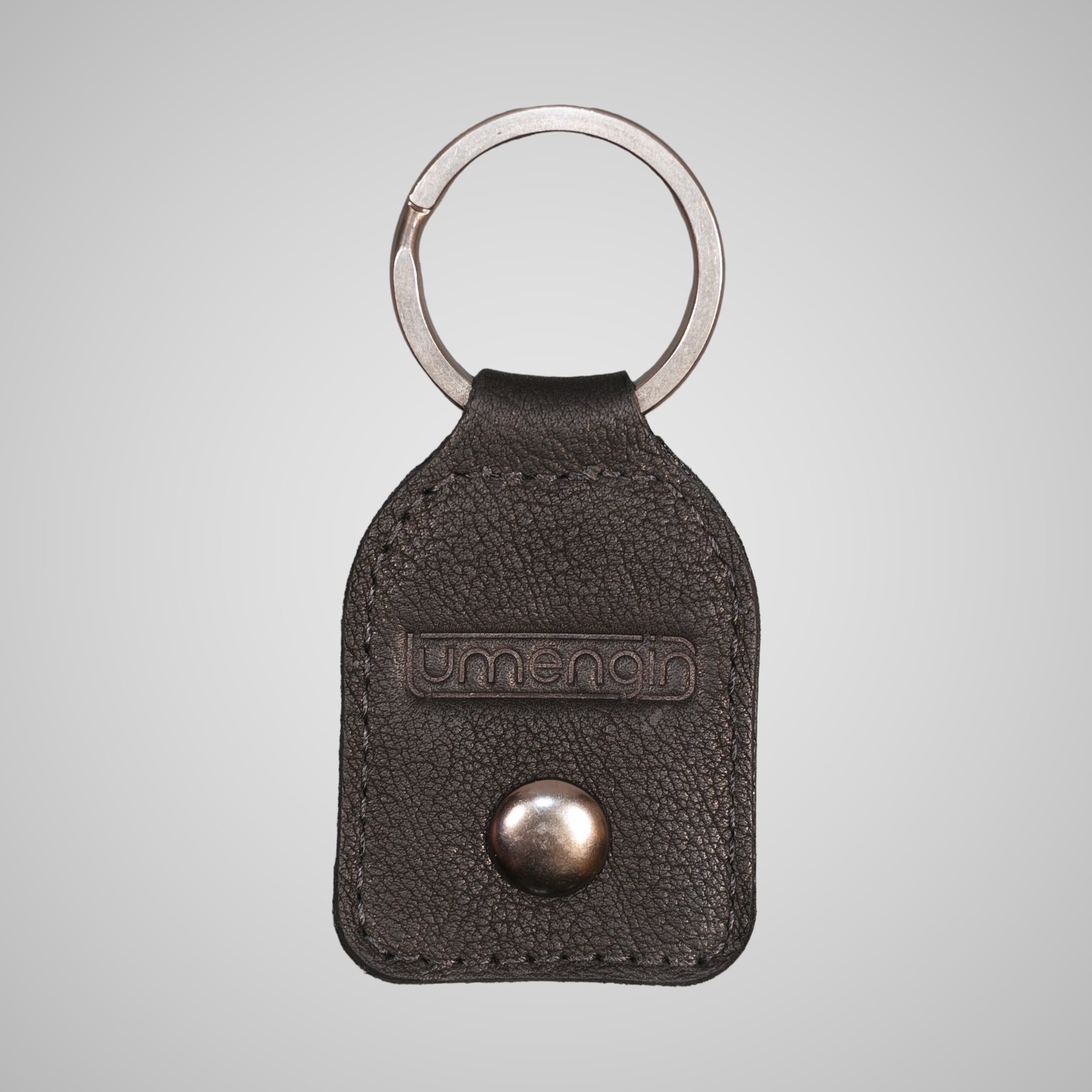 Lumengin black Janus calf £1 coin holder keyring, embossed lumengin logo side on soft grey background